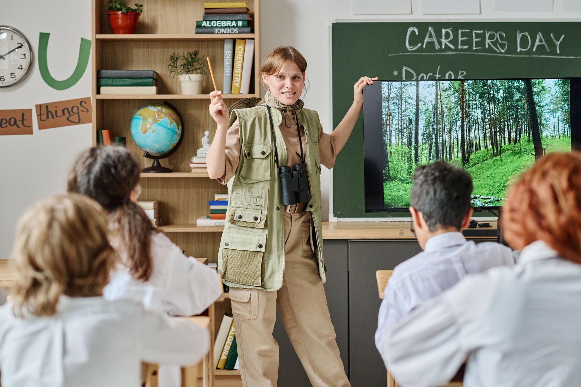 Forester Giving Presentation About Her Job To Kids